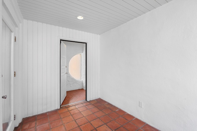 unfurnished bedroom featuring tile patterned flooring and a closet