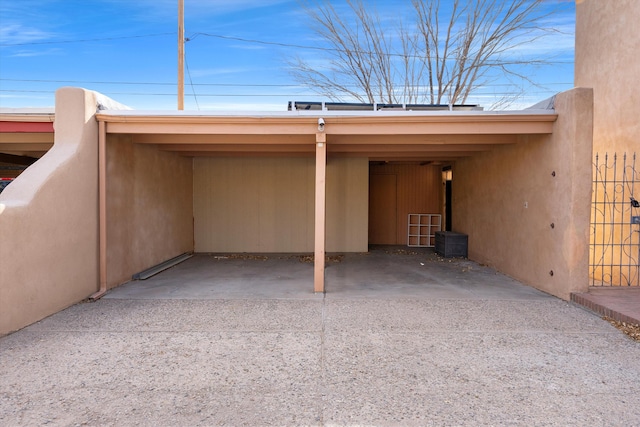 view of car parking featuring a carport