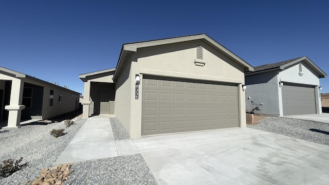 single story home with a garage