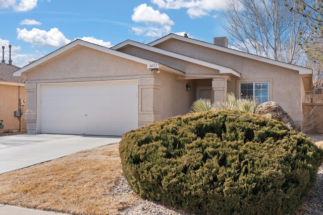 ranch-style home with a garage