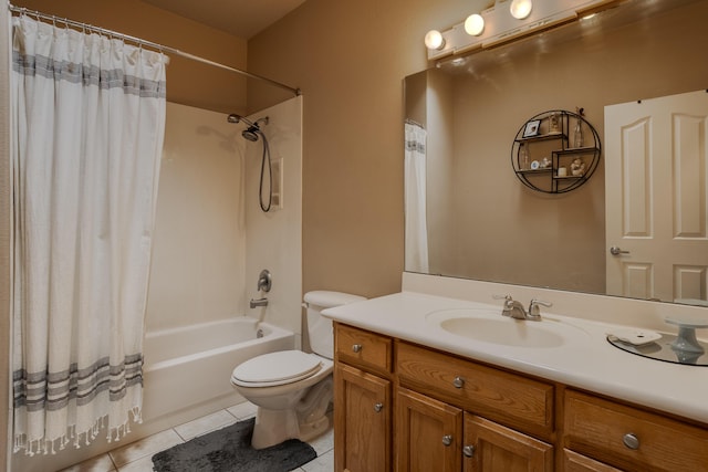 full bathroom featuring tile patterned floors, toilet, vanity, and shower / bath combo