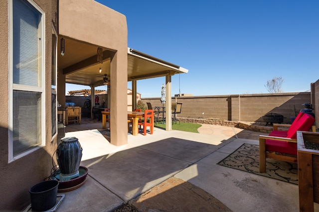 view of patio with ceiling fan