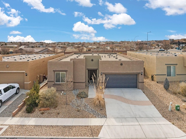 southwest-style home with a garage