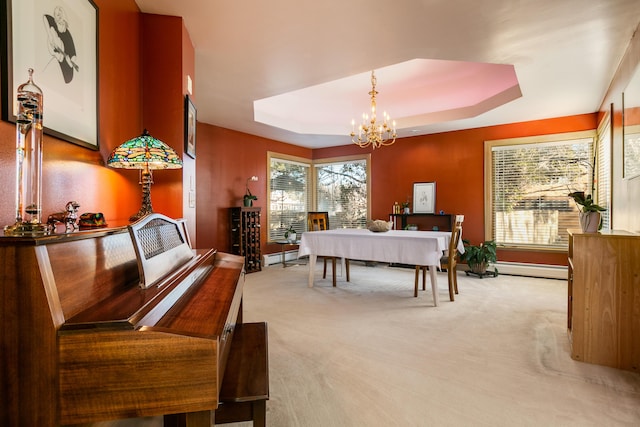 carpeted dining area with a raised ceiling, a baseboard radiator, and a notable chandelier