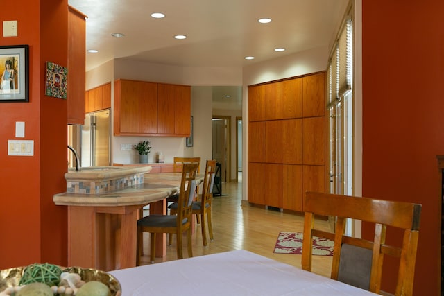 dining room with light wood-type flooring