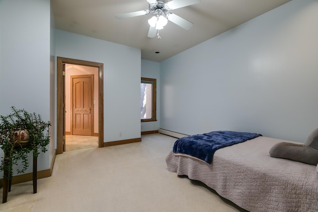 bedroom featuring ceiling fan, a baseboard radiator, and light carpet