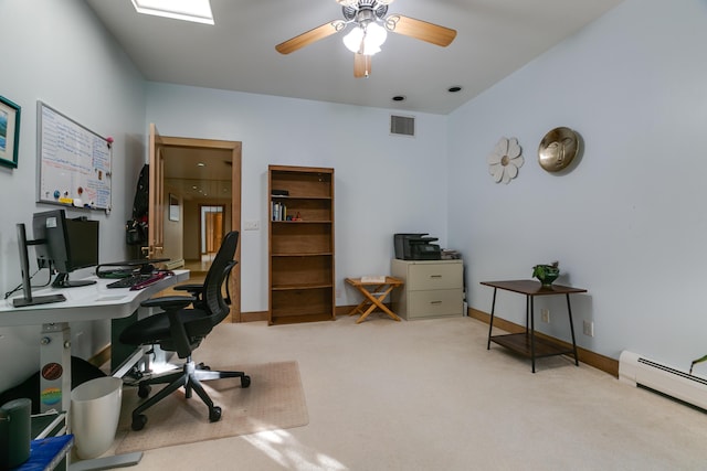 office with a baseboard radiator, light carpet, and ceiling fan