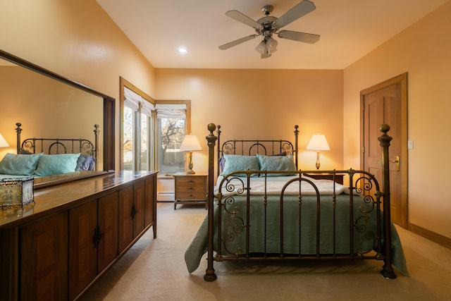 carpeted bedroom featuring a baseboard radiator