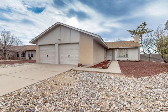 single story home with a garage