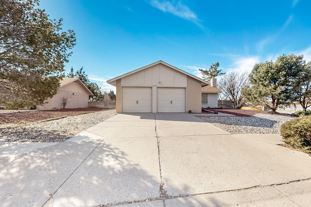 view of side of home with a garage