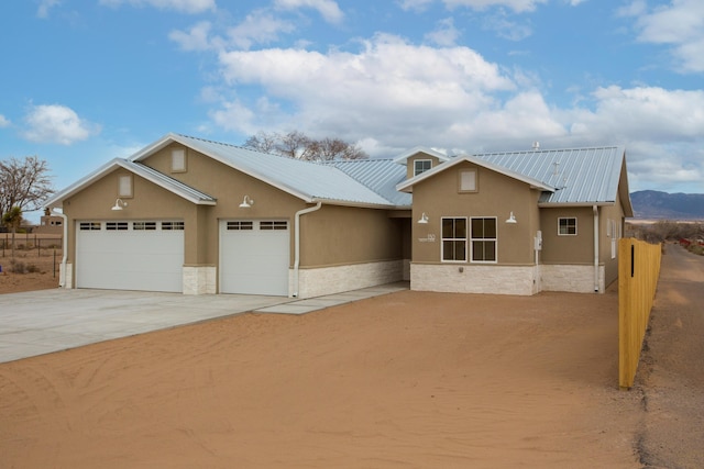 single story home featuring a garage