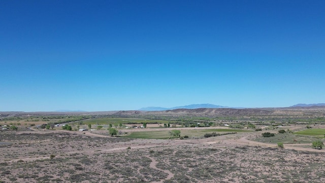 view of mountain feature with a rural view