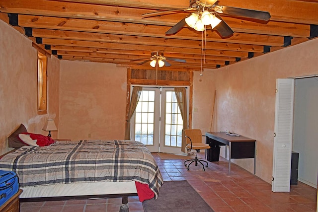 bedroom featuring beamed ceiling and ceiling fan