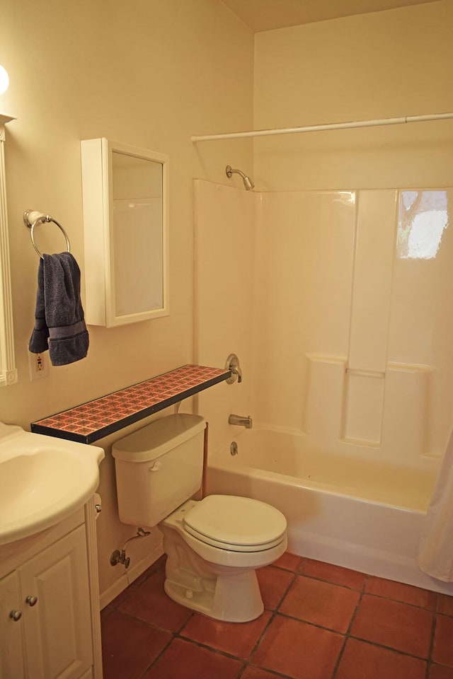 full bathroom with washtub / shower combination, vanity, toilet, and tile patterned flooring