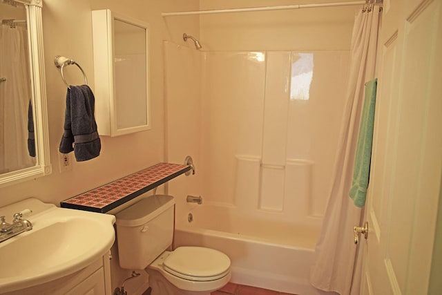 full bathroom with sink, shower / bathtub combination with curtain, and toilet