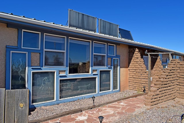 view of home's exterior with a patio area