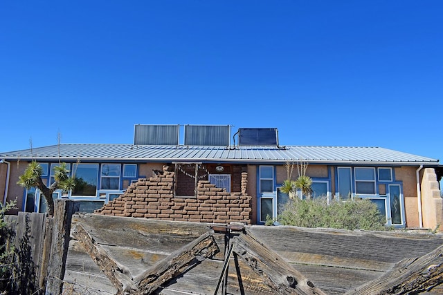 view of front of home with central AC