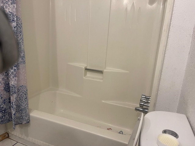 10613 Benavides Rd SW, Albuquerque, NM 87121 - bathroom featuring shower / bath combination with curtain and tile patterned flooring