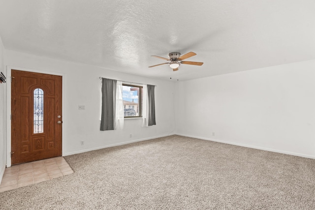 1613 Del Monte Trl SW, Albuquerque, NM 87121 - foyer entrance with ceiling fan, light colored carpet, and a textured ceiling