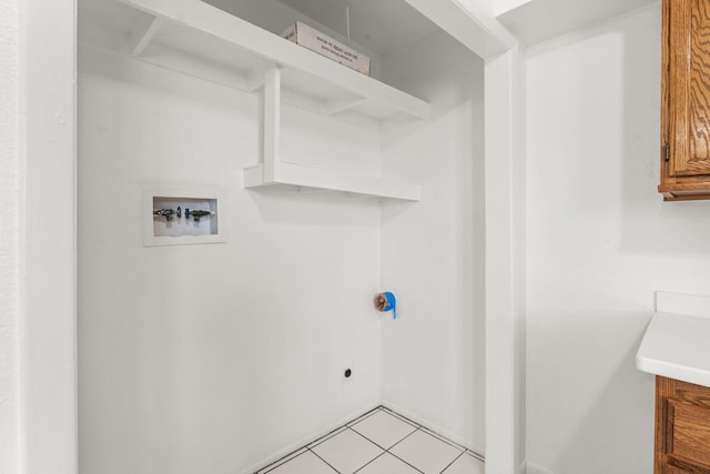 1613 Del Monte Trl SW, Albuquerque, NM 87121 - laundry area with washer hookup and light tile patterned flooring