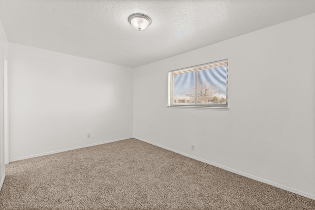 1613 Del Monte Trl SW, Albuquerque, NM 87121 - empty room featuring carpet and a textured ceiling