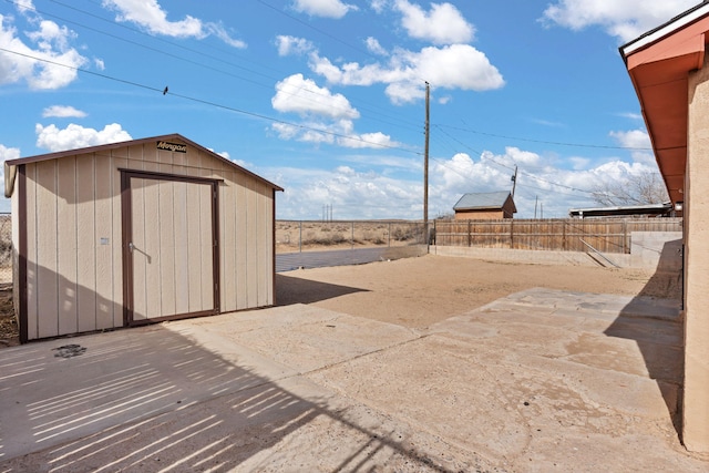 1613 Del Monte Trl SW, Albuquerque, NM 87121 - view of patio / terrace featuring a storage shed