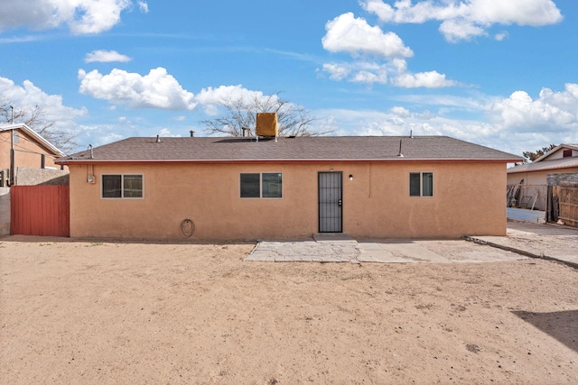 1613 Del Monte Trl SW, Albuquerque, NM 87121 - rear view of house featuring a patio