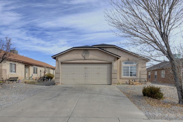 ranch-style home with a garage