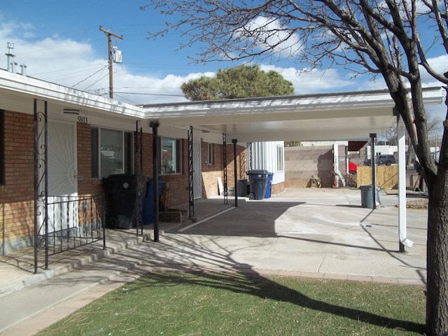 exterior space featuring a carport