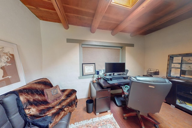 home office featuring beamed ceiling, wood finished floors, and wood ceiling