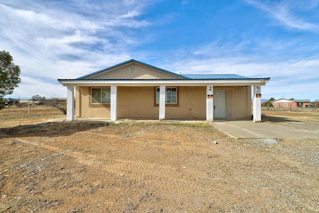 view of front of property featuring stucco siding