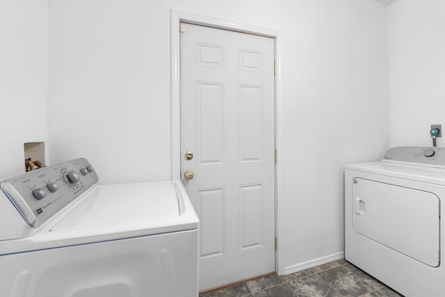 washroom with washer and dryer