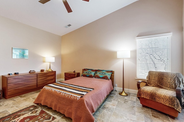 bedroom featuring lofted ceiling and ceiling fan