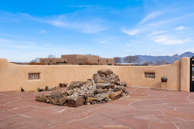 view of patio with a mountain view