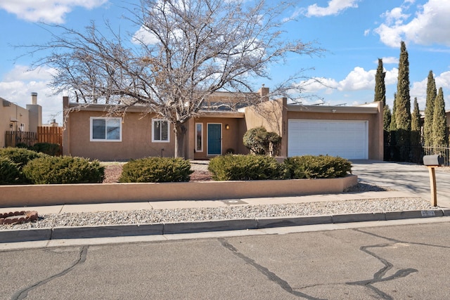 single story home with a garage