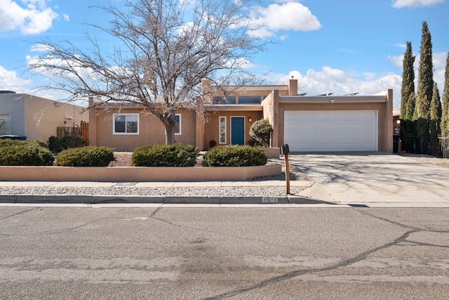 adobe home with a garage