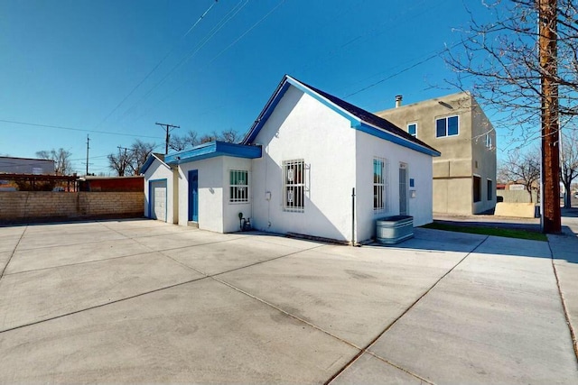 view of home's exterior featuring a garage