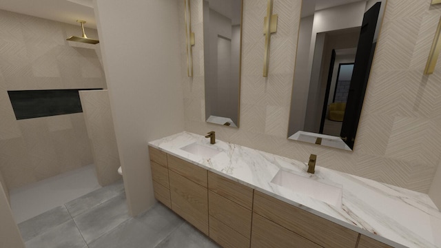 bathroom featuring walk in shower, tile patterned floors, and vanity