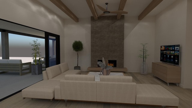 living room featuring a high ceiling, light wood-style floors, beamed ceiling, and a large fireplace