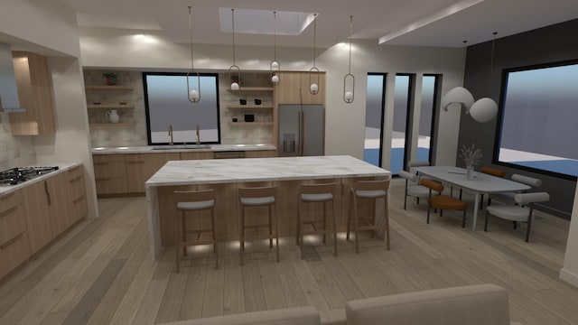 kitchen with a spacious island, open shelves, stainless steel appliances, light wood-style floors, and modern cabinets