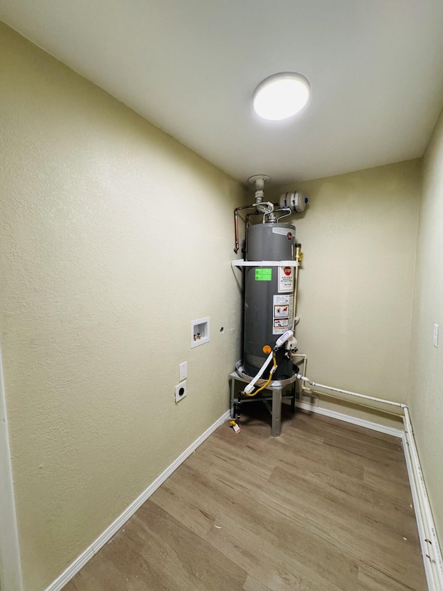 utility room with water heater