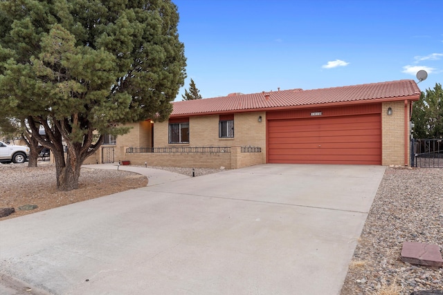 ranch-style home with a garage