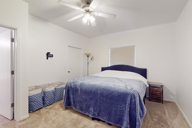 bedroom with ceiling fan and carpet