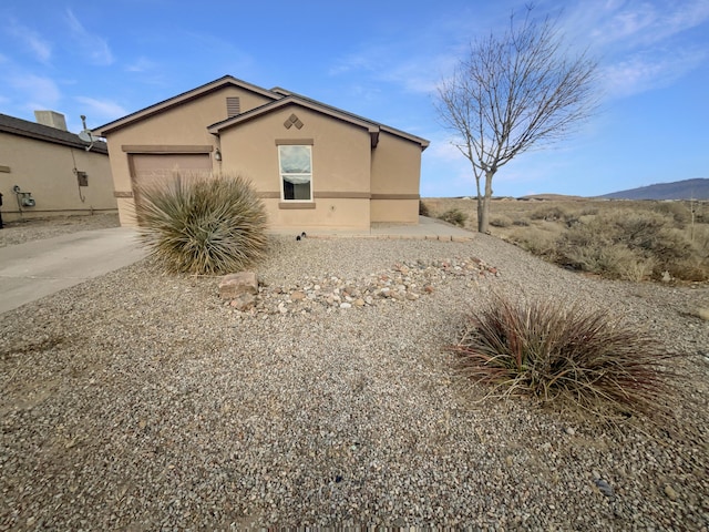 view of home's exterior with a garage