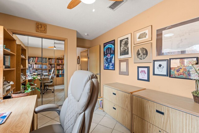 8008 Loma Larga Rd, Corrales, NM 87048 - office area featuring ceiling fan and light tile patterned floors