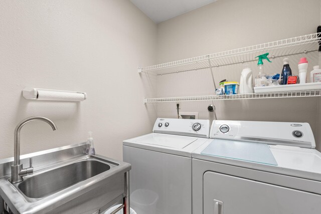 8008 Loma Larga Rd, Corrales, NM 87048 - washroom featuring separate washer and dryer