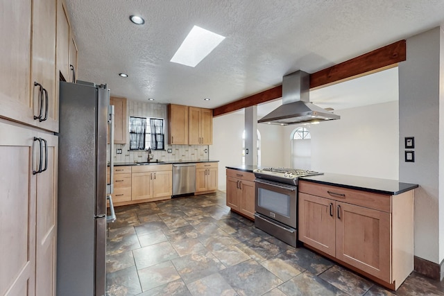 kitchen with light brown cabinetry, a sink, backsplash, stainless steel appliances, and exhaust hood