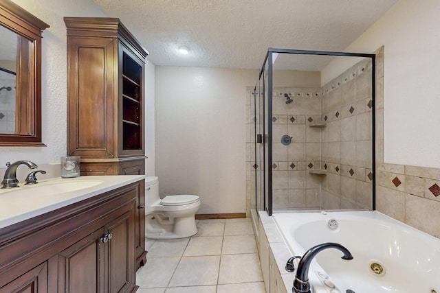 bathroom featuring a textured ceiling, a jetted tub, a shower stall, and toilet