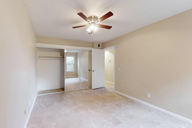 unfurnished bedroom featuring a closet and ceiling fan