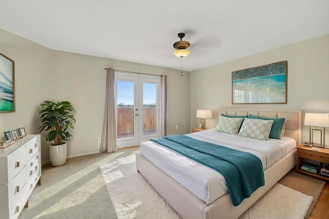 bedroom with light carpet, access to exterior, ceiling fan, and french doors